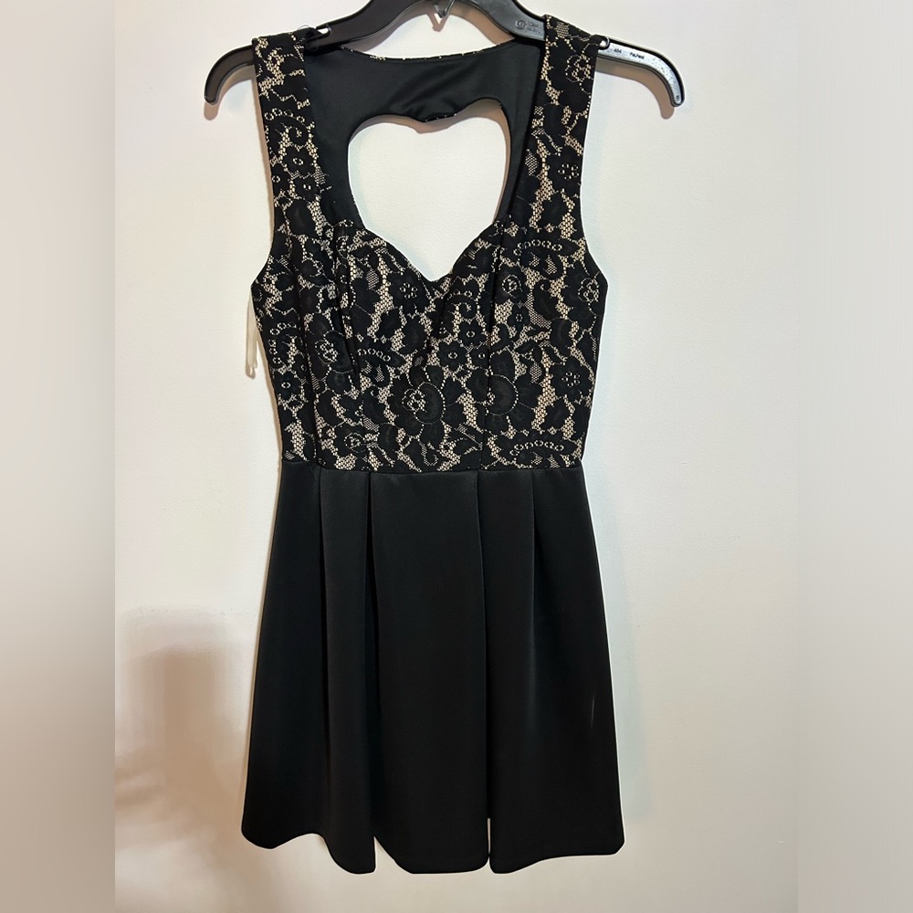 Elegant black and tan dress with lace at the top Heart shape cut out back